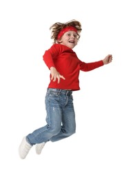 Happy little boy dancing on white background