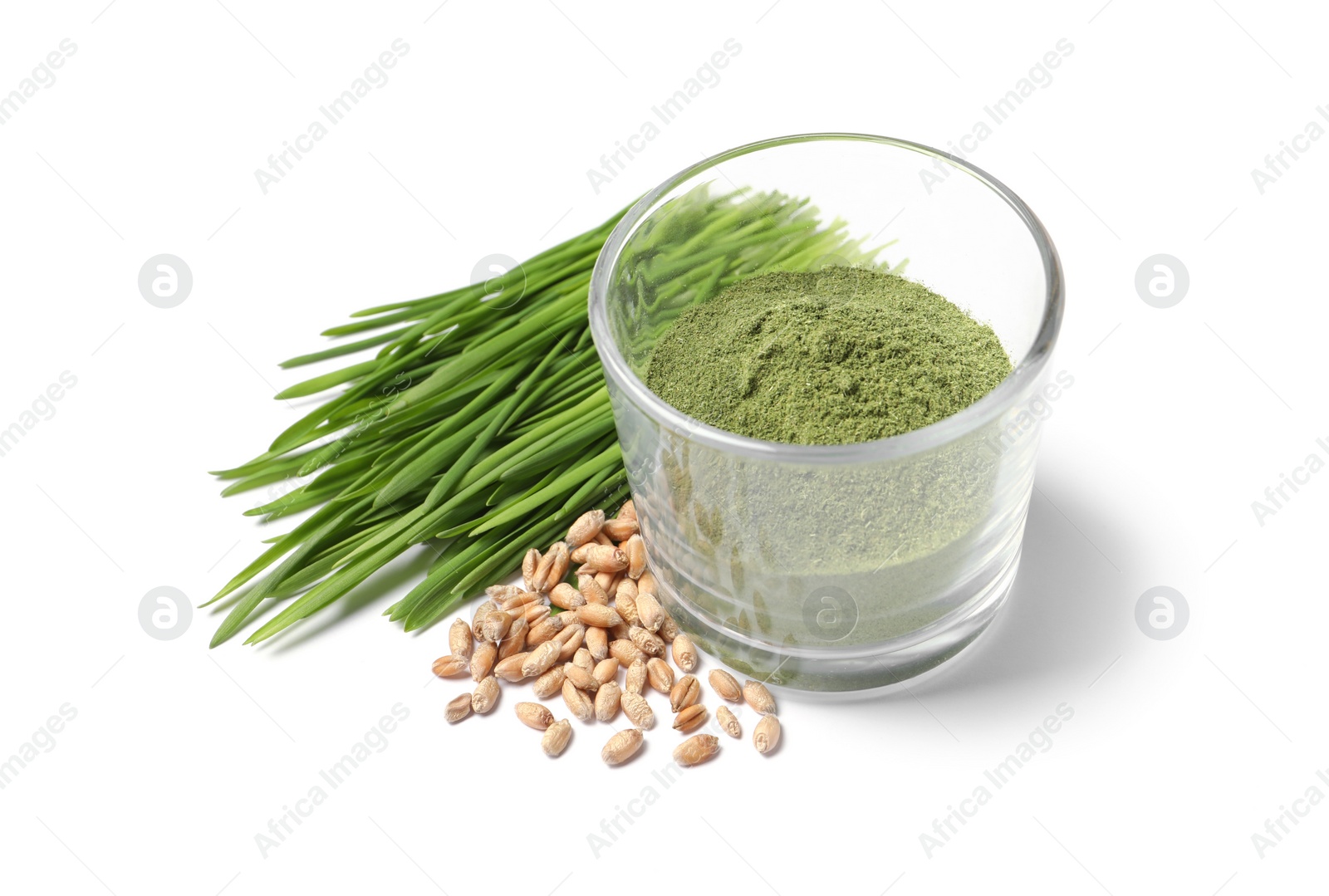 Photo of Wheat grass powder in glass, seeds and fresh sprouts isolated on white