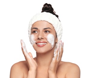 Photo of Beautiful woman applying facial cleansing foam on white background