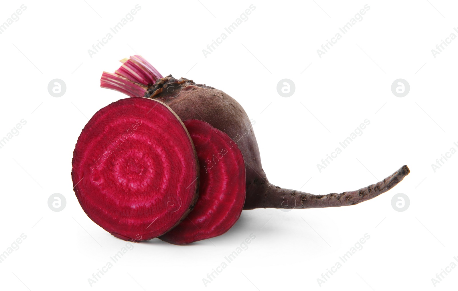 Photo of Whole and cut fresh red beets on white background
