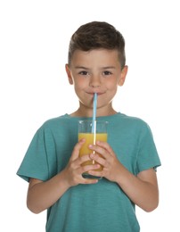 Little boy drinking juice on white background
