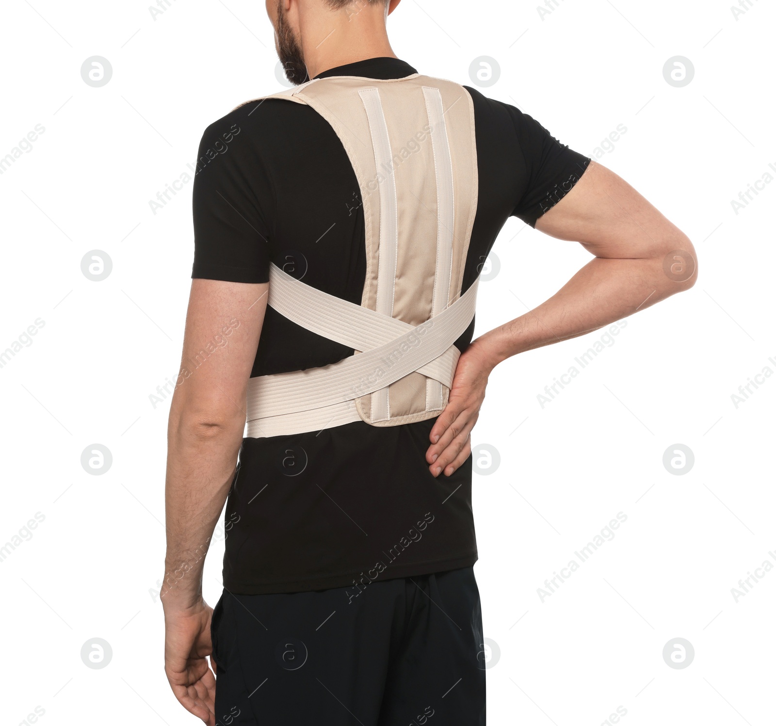 Photo of Closeup view of man with orthopedic corset on white background