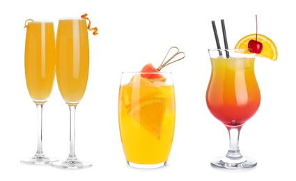 Image of Set with delicious Mimosa cocktails on white background, banner design