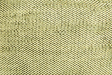 Photo of Texture of beautiful beige fabric as background, closeup
