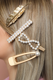 Photo of Woman with beautiful different hair clips, closeup