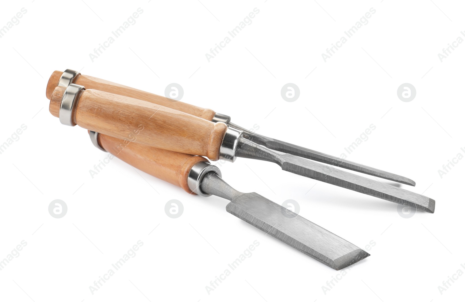 Photo of Modern chisels isolated on white. Carpenter's tools