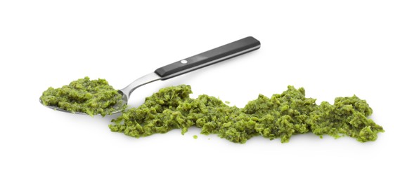 Spoon with delicious pesto sauce isolated on white