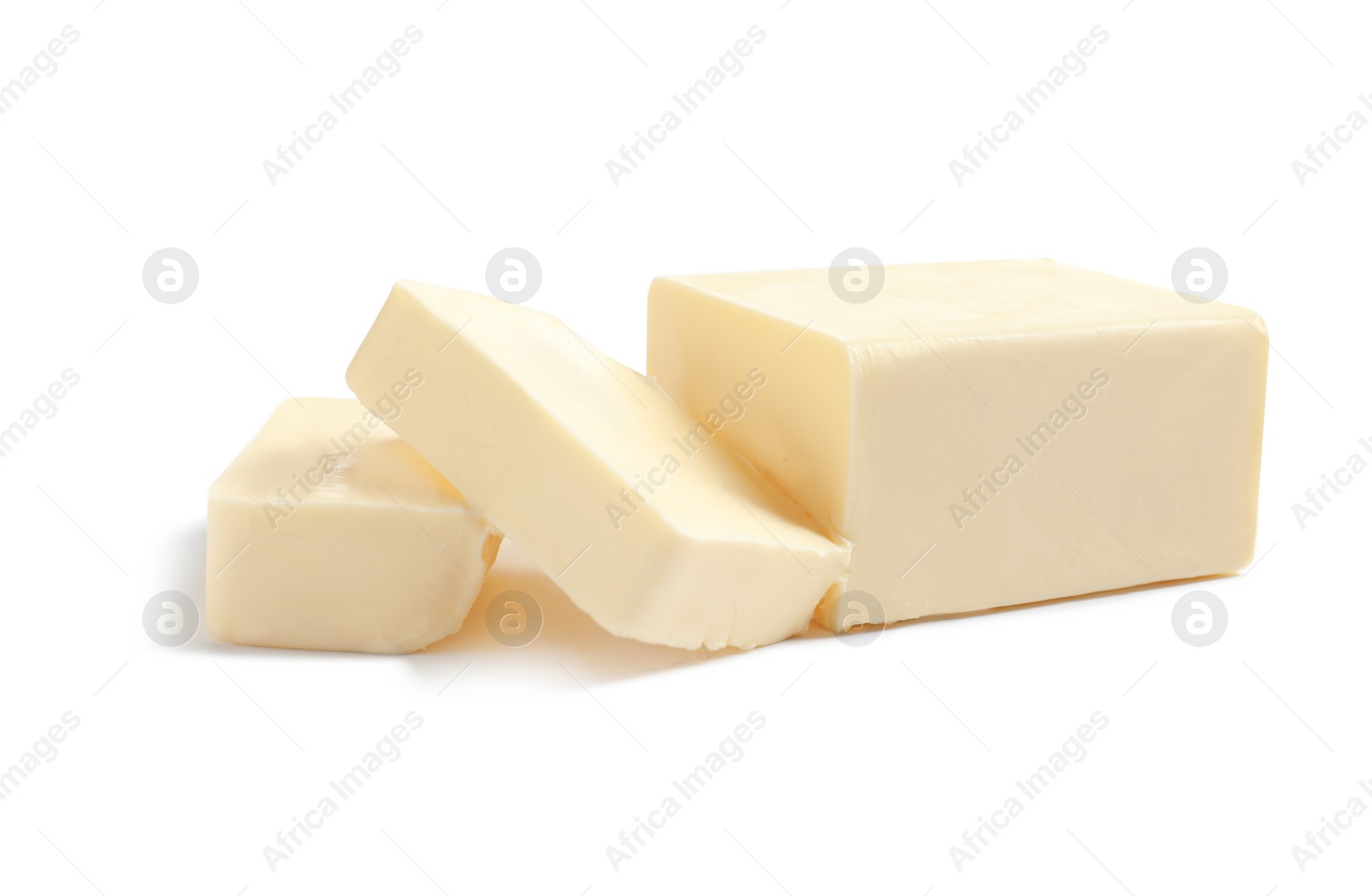 Photo of Cut block of fresh butter on white background