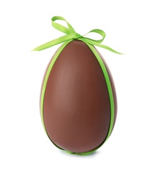 Photo of Tasty chocolate Easter egg with bow knot on white background