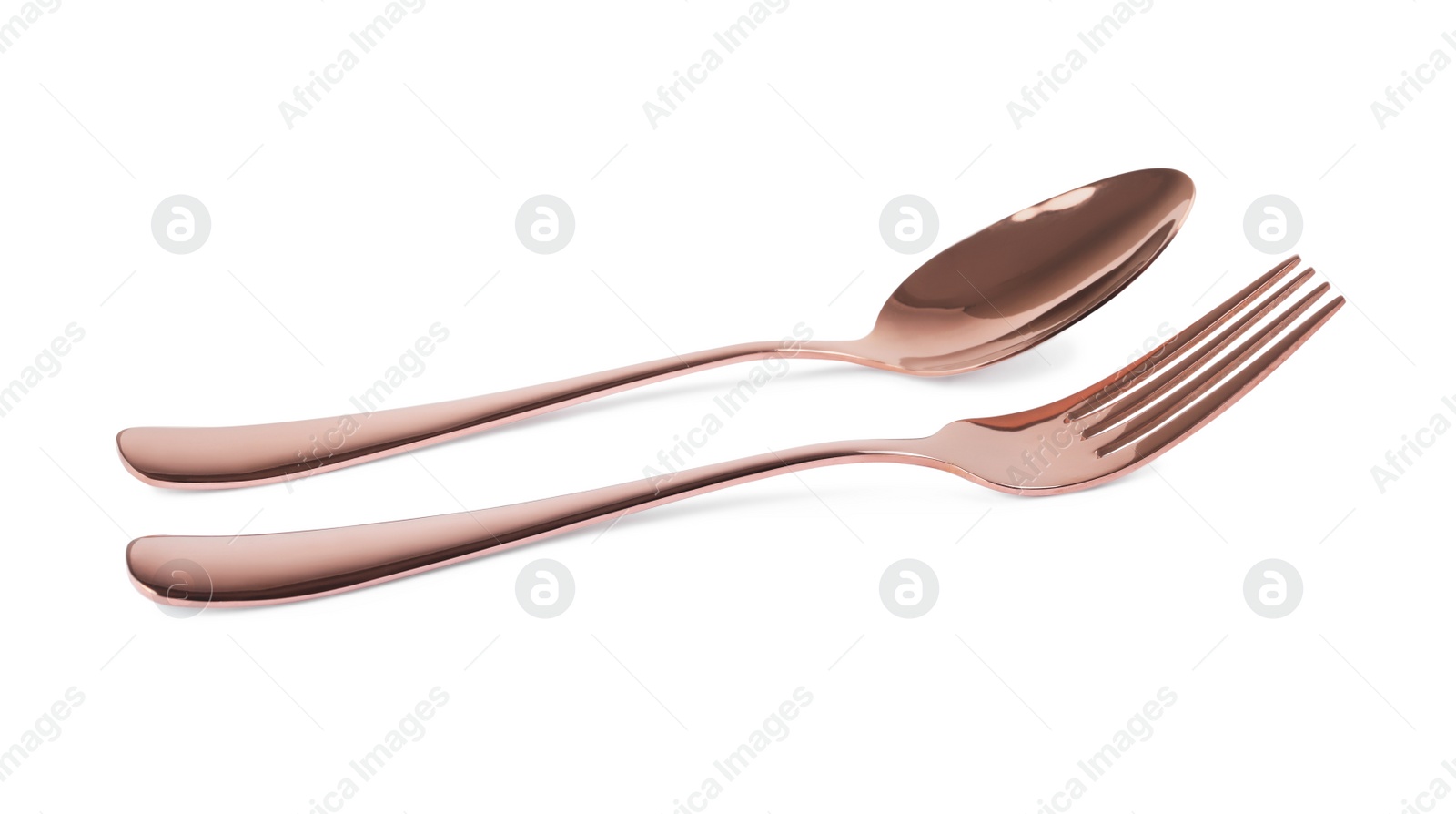 Photo of New shiny fork and spoon on white background