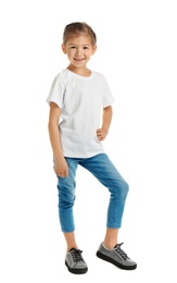Photo of Little girl in t-shirt on white background. Mockup for design