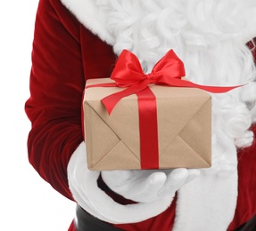 Santa Claus holding Christmas gift  on white background, closeup