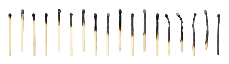 Image of Set with burnt matches on white background. Banner design