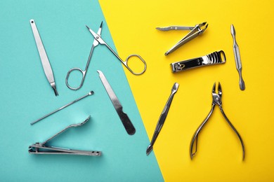 Set of manicure tools on color background, flat lay
