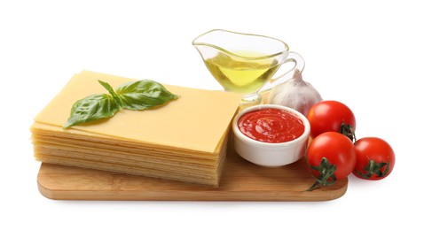 Uncooked ingredients for lasagna isolated on white