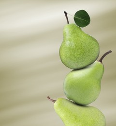 Image of Fresh ripe pears on yellow green gradient background