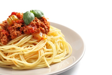 Photo of Plate with delicious pasta bolognese on white background