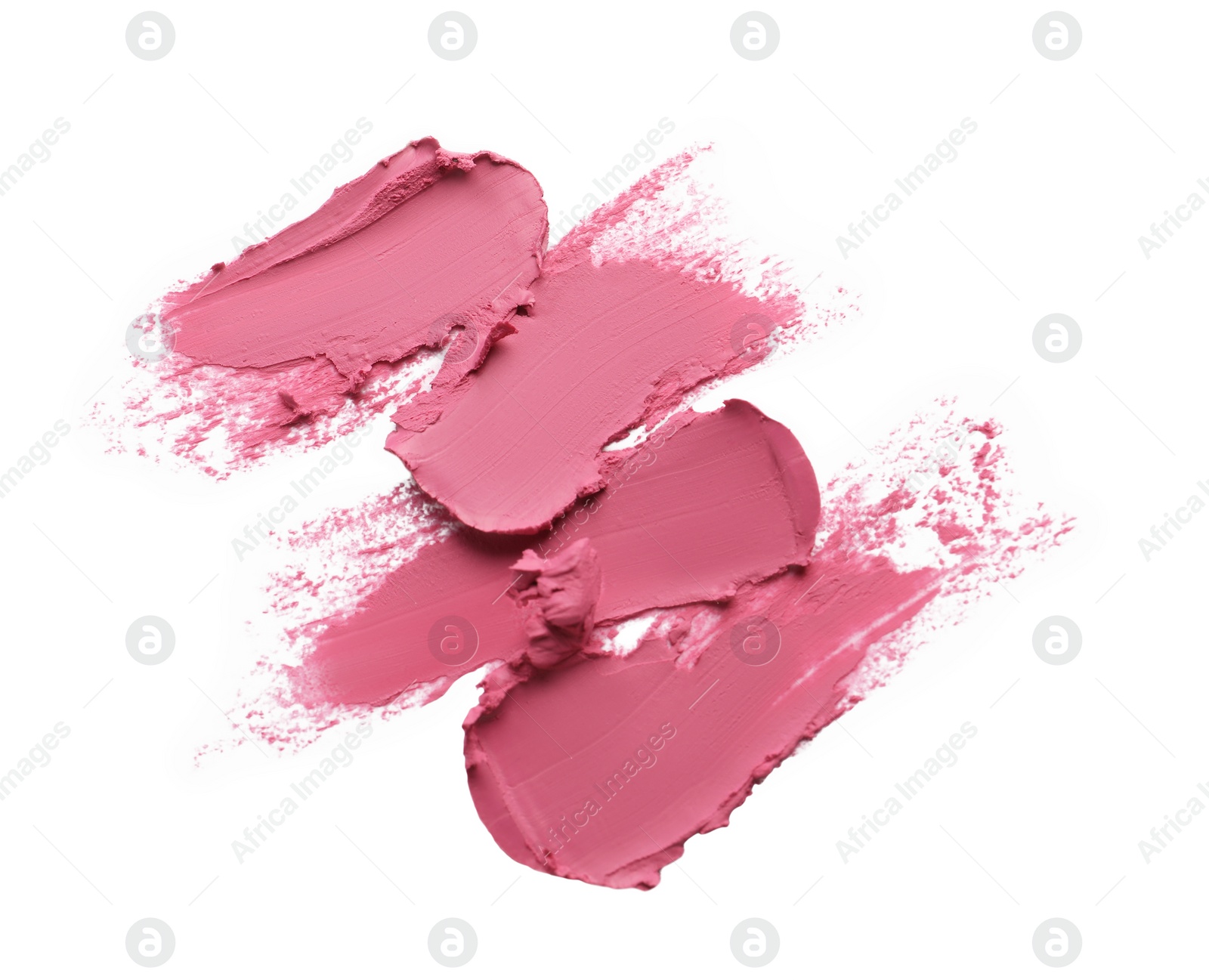 Photo of Smears of bright lipstick on white background, top view