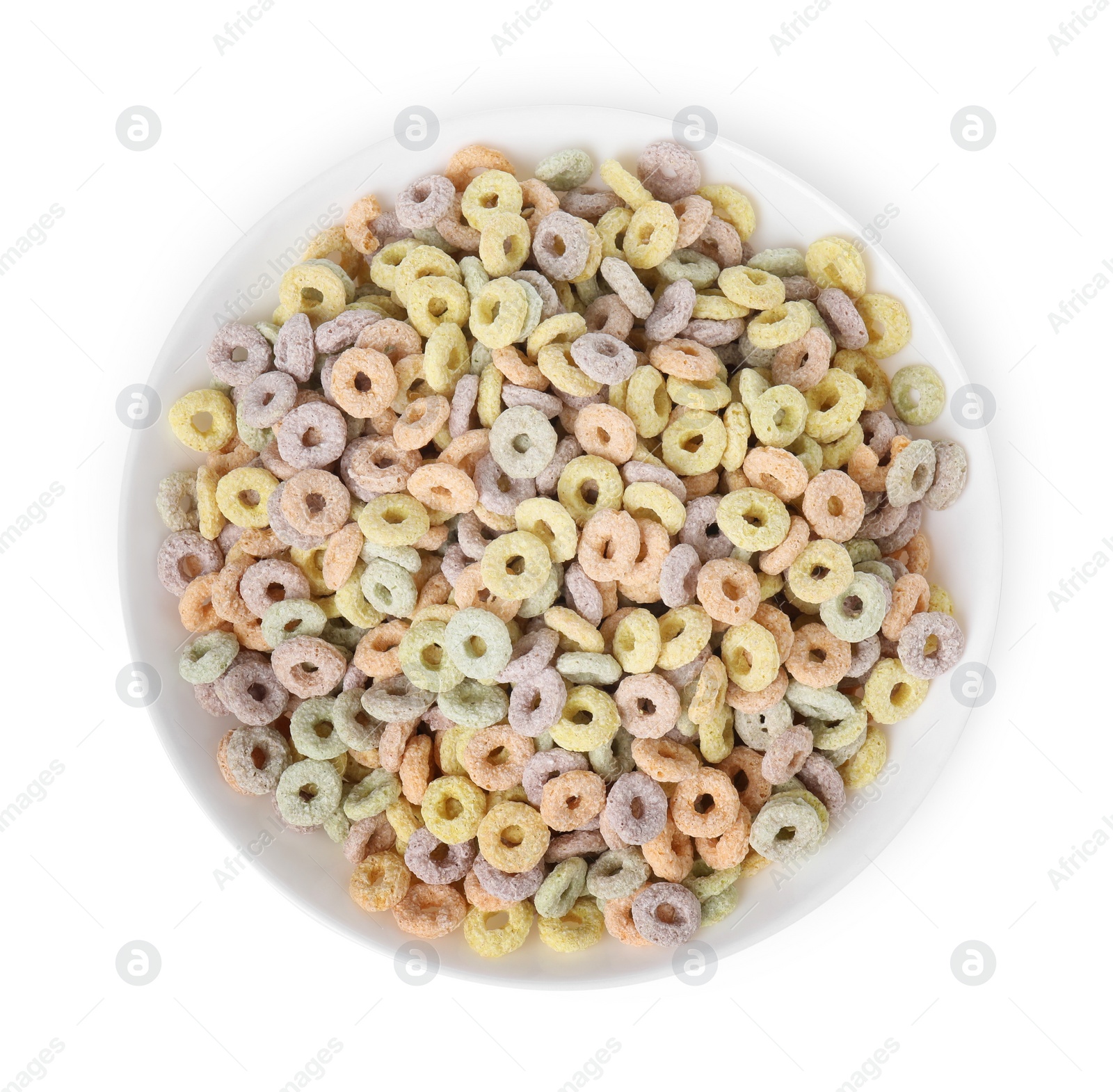 Photo of Tasty cereal rings in bowl isolated on white, top view