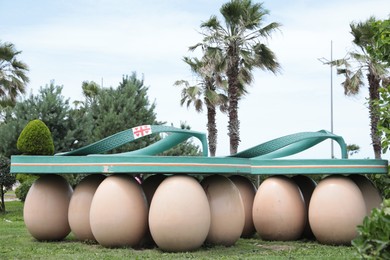 Batumi, Georgia - June 24, 2022: Beautiful art installation Sea Slippers on Eggs