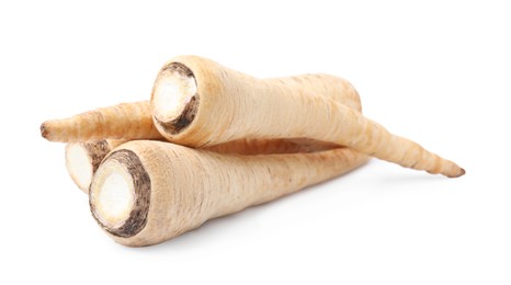 Raw parsley roots isolated on white. Healthy food