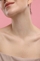 Photo of Beauty concept. Woman on pink background, closeup