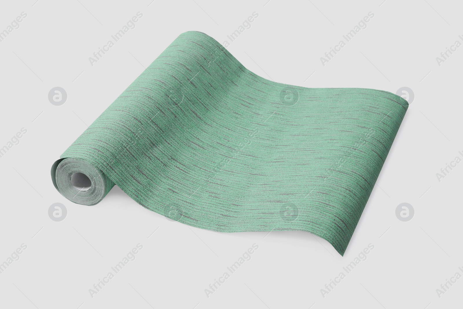 Image of One green wallpaper roll isolated on white