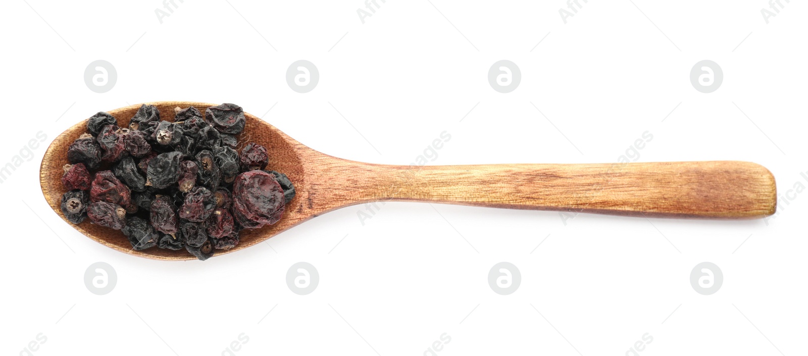 Photo of Dried black currants in wooden spoon isolated on white, top view