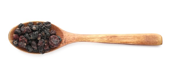 Photo of Dried black currants in wooden spoon isolated on white, top view