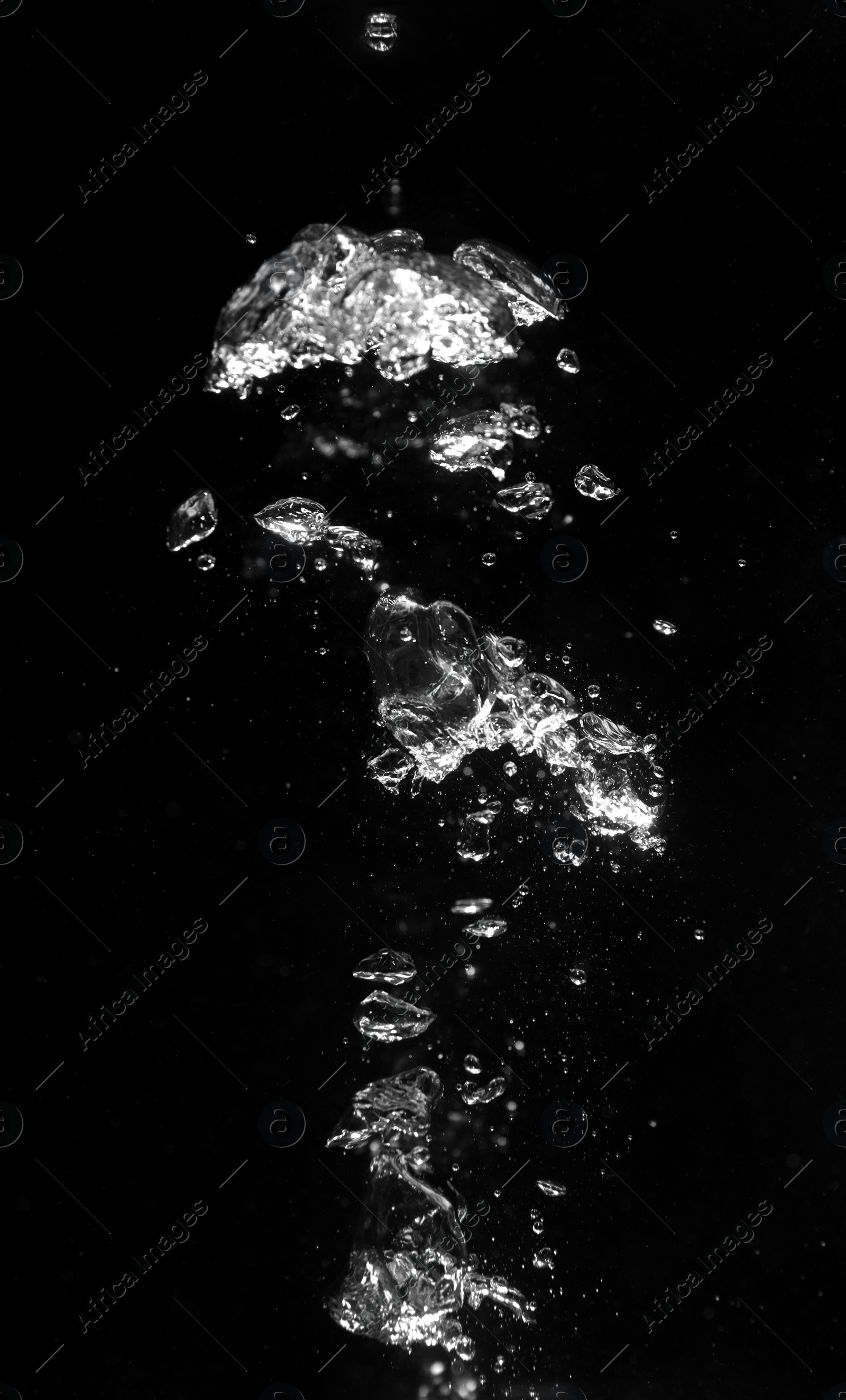 Photo of Air bubbles in water on black background