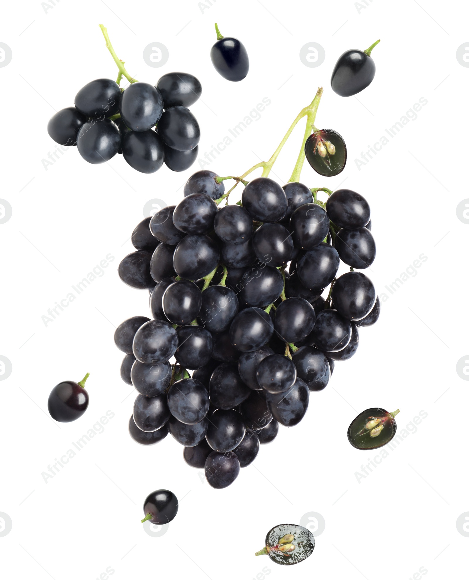 Image of Fresh ripe grapes falling on white background