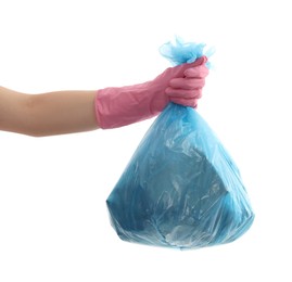 Photo of Woman holding plastic bag full of garbage on white background, closeup