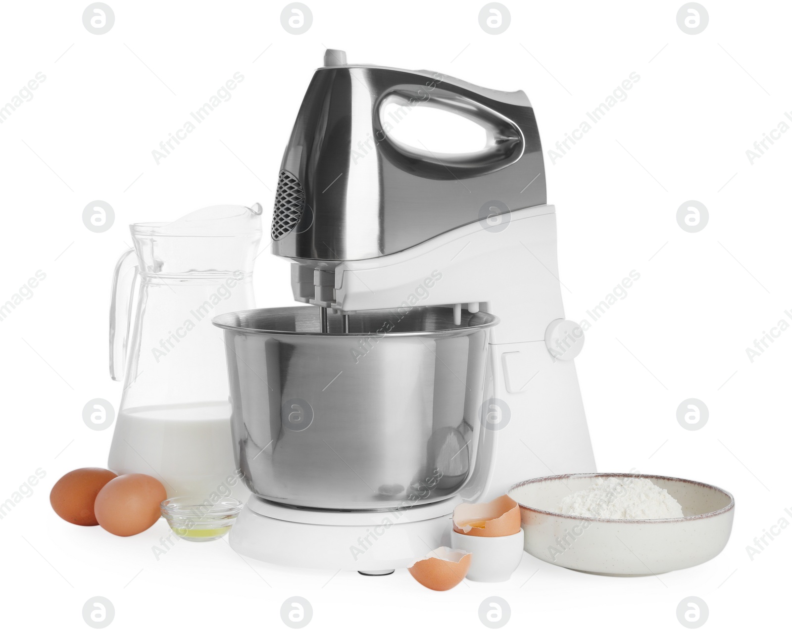 Photo of Stand mixer and different ingredients for dough isolated on white