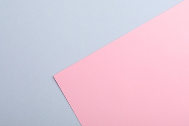 Photo of Colorful paper sheets as background, top view