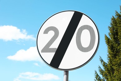 Photo of Traffic sign End Of Limited Speed Zone against blue sky
