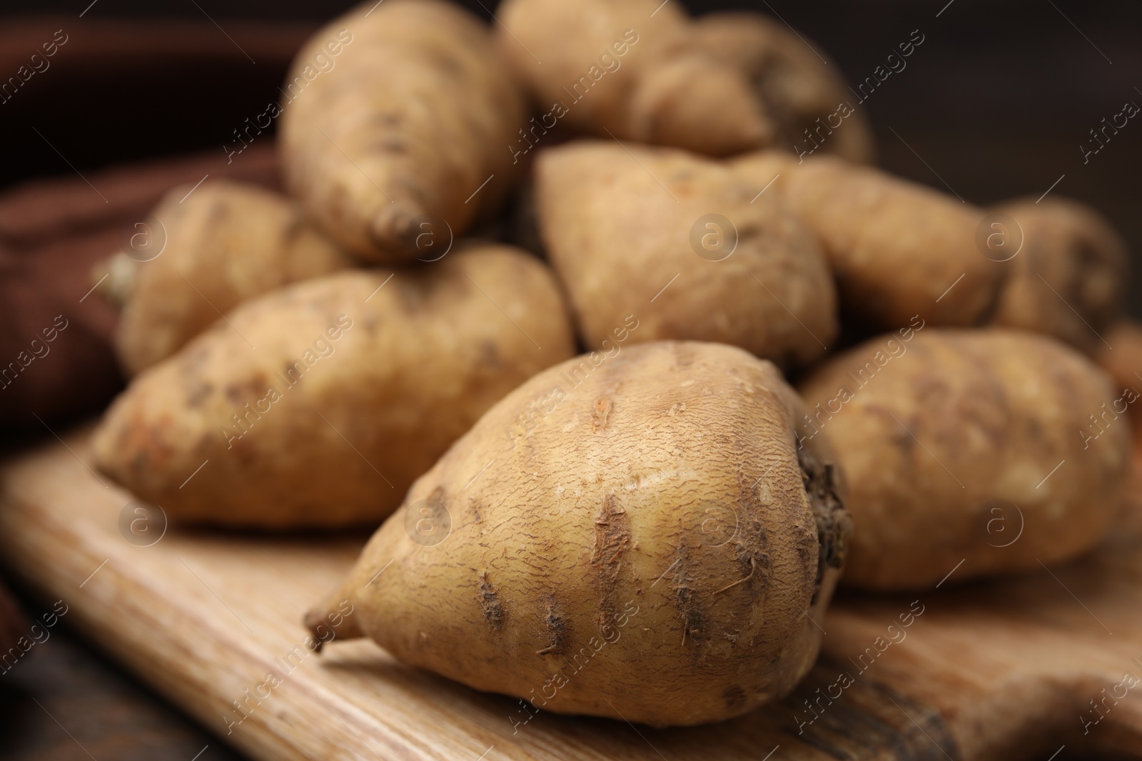 Photo of Tubers of turnip rooted chervil on table, closeup