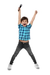 Photo of Cute little boy singing into microphone on white background