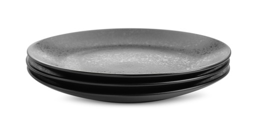 Three black ceramic plates isolated on white