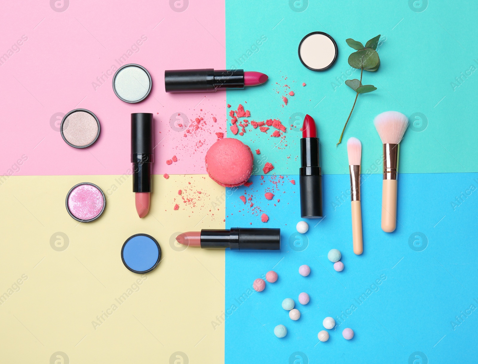 Photo of Decorative makeup products on color background