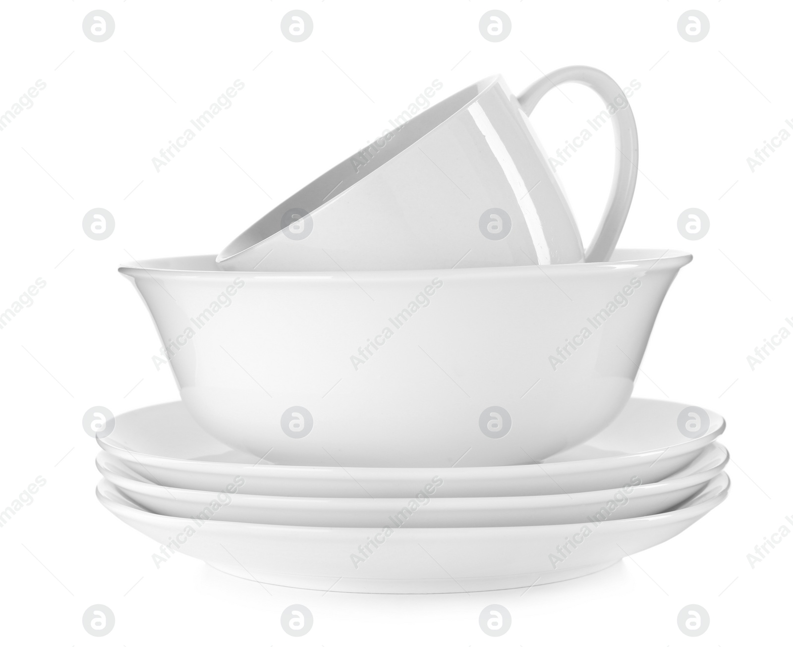 Photo of Stack of ceramic tableware isolated on white