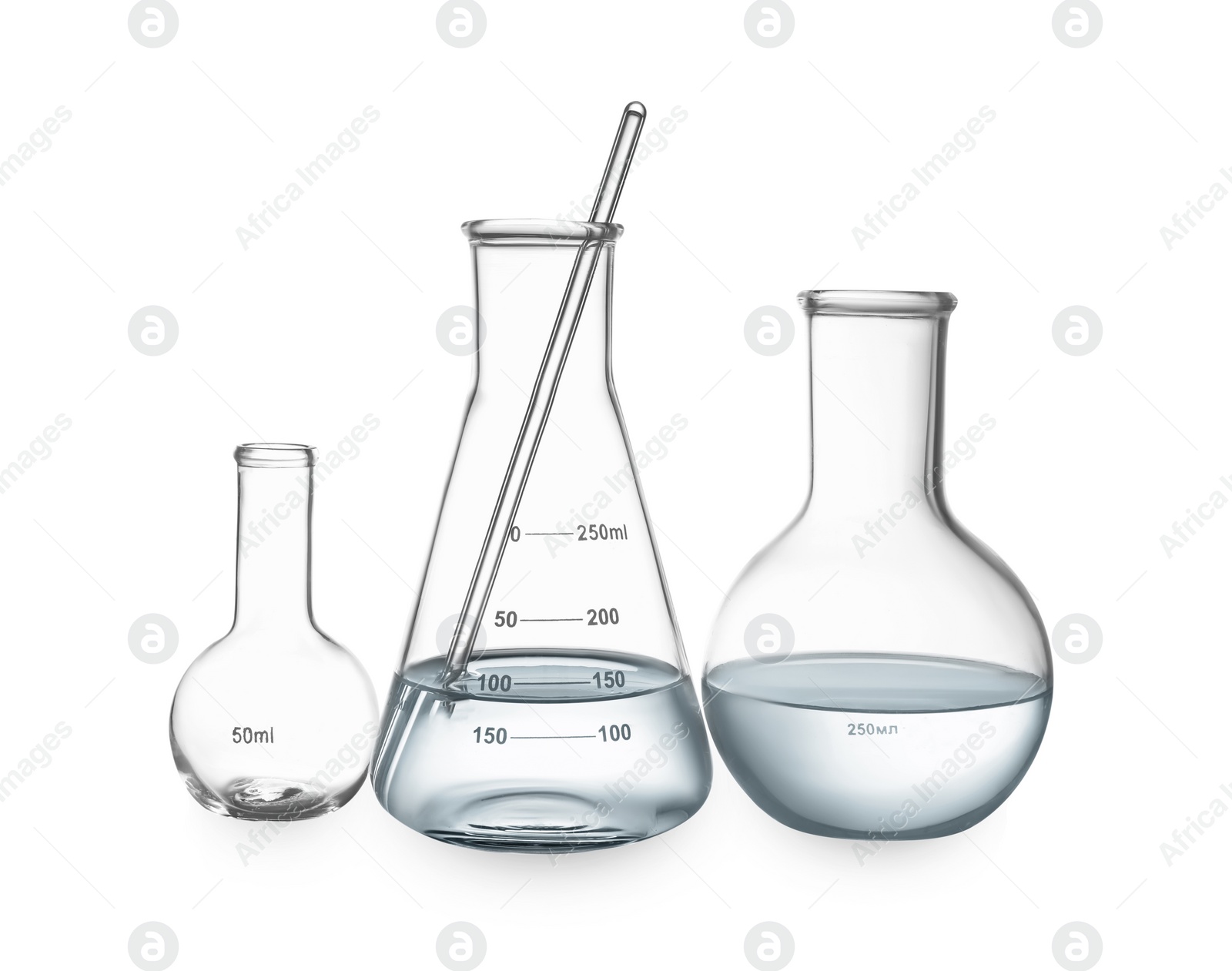 Image of Glass flasks with water and stirring rod isolated on white