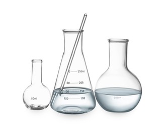 Image of Glass flasks with water and stirring rod isolated on white