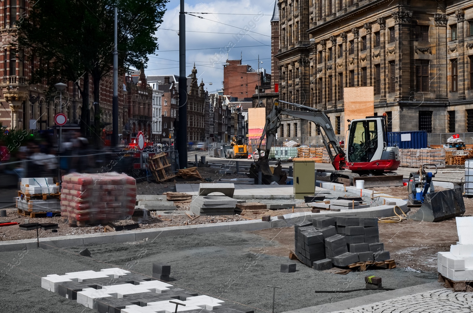 Photo of Road repair machine working on city street