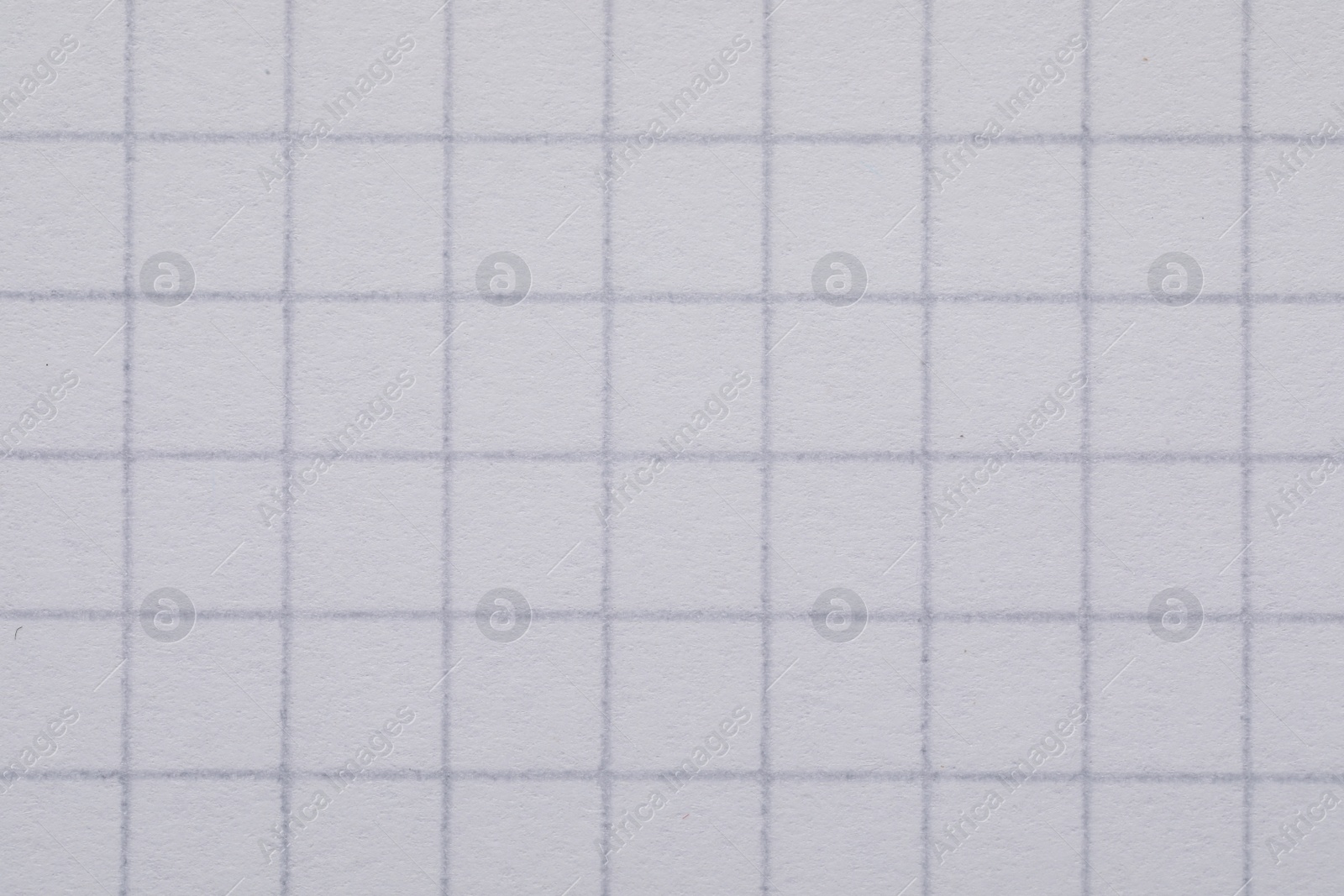 Photo of Texture of copybook paper sheet as background, closeup
