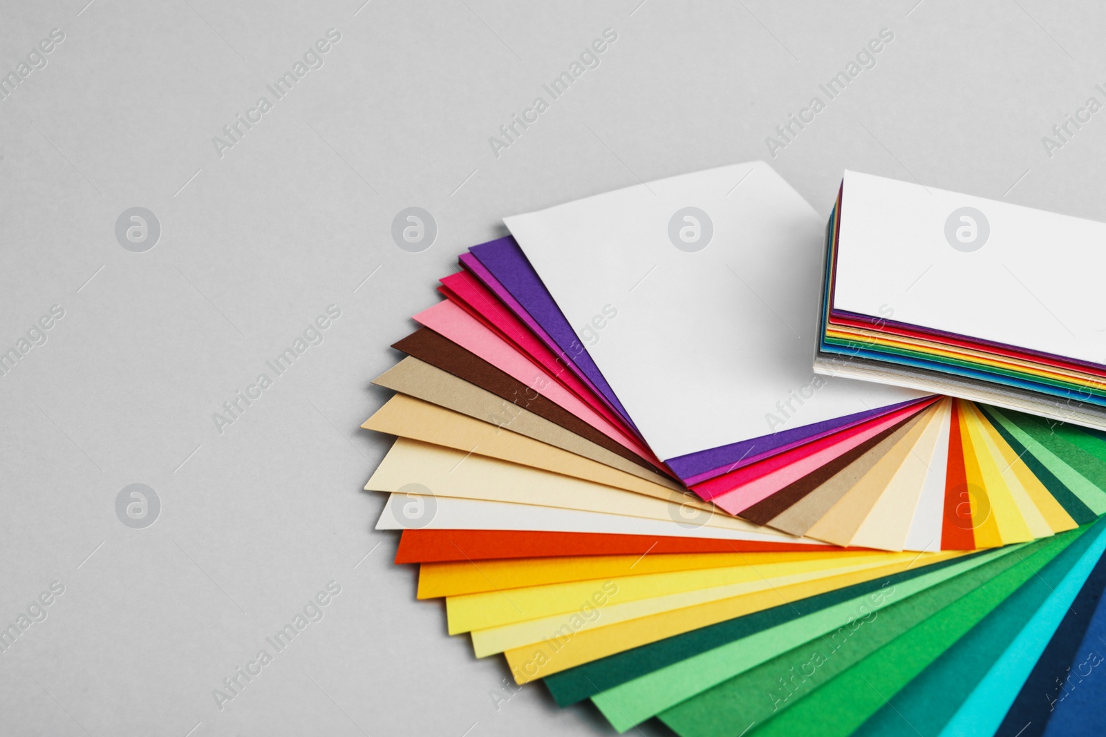 Photo of Color palettes on light grey background, closeup