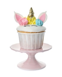 Photo of Dessert stand with cute sweet unicorn cupcake isolated on white