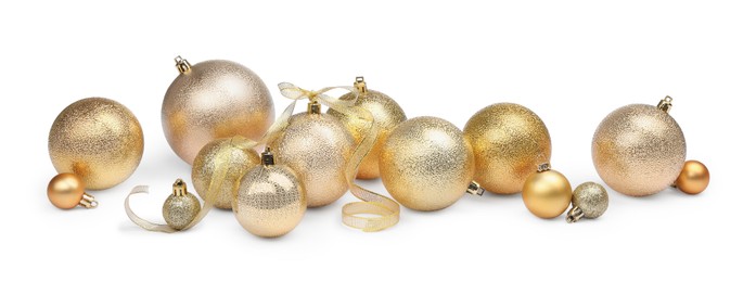 Photo of Many golden Christmas balls isolated on white