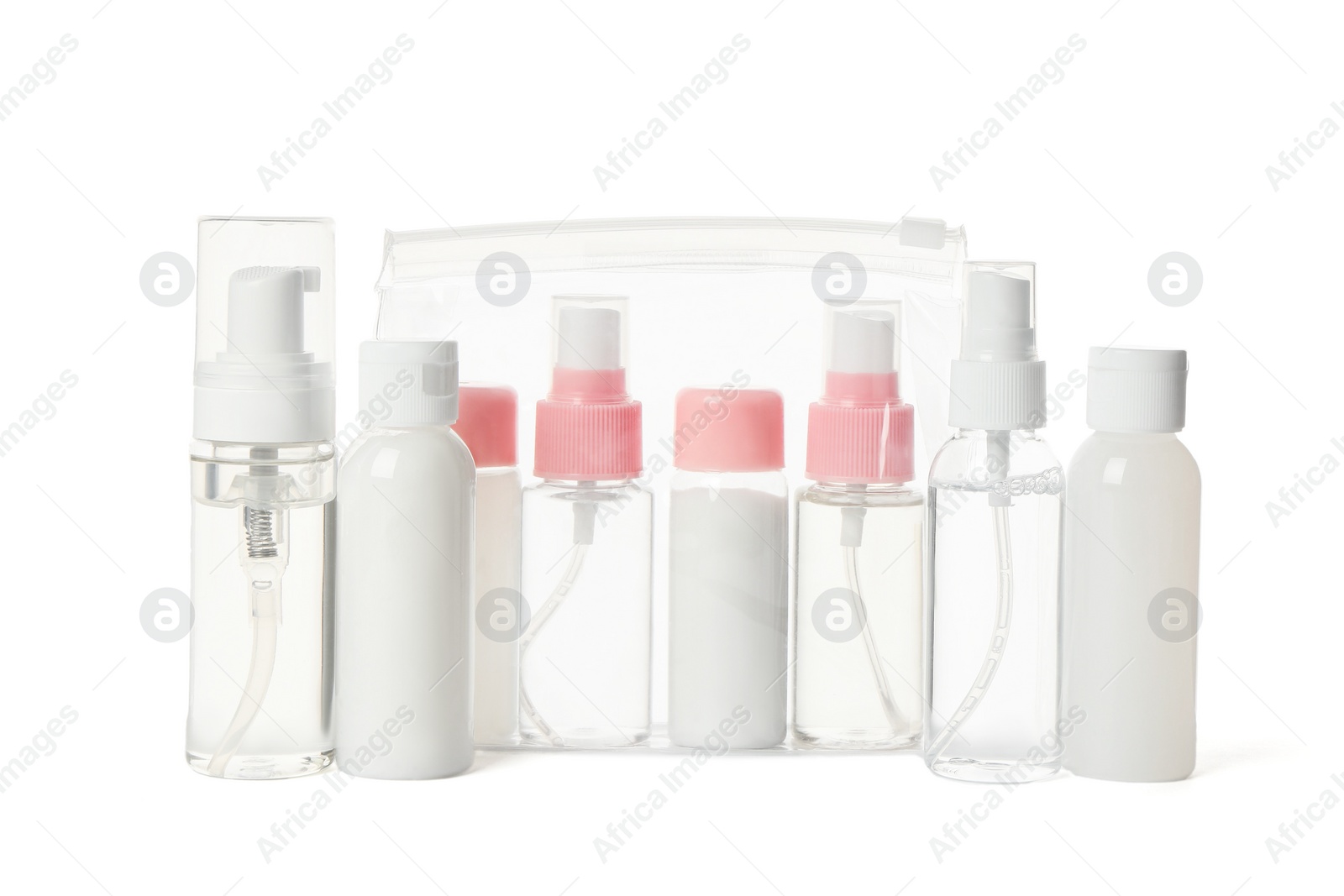 Photo of Cosmetic travel kit with plastic bag isolated on white