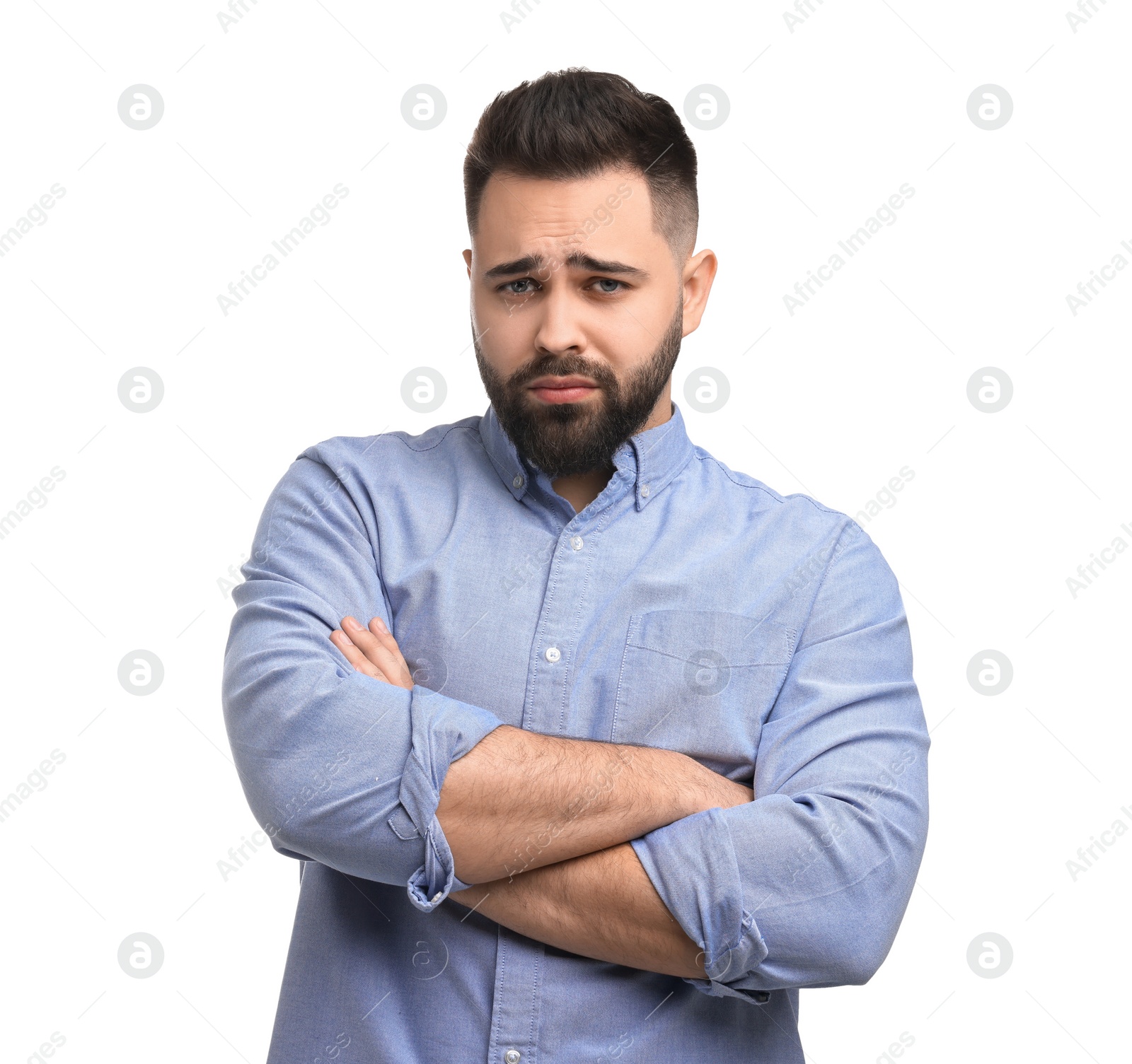 Photo of Portrait of sad man with crossed arms on white background