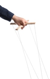 Photo of Businesswoman holding puppet control bar with strings on white background, closeup